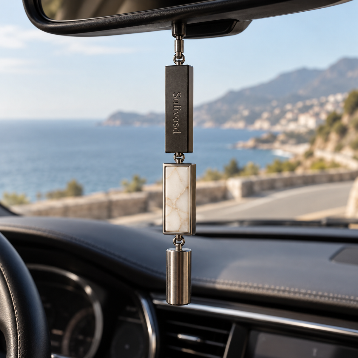 Dark rectangular upper element with an ivory marble-look inset and metallic cylindrical drop